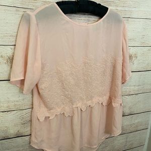 Women’s light pink blouse